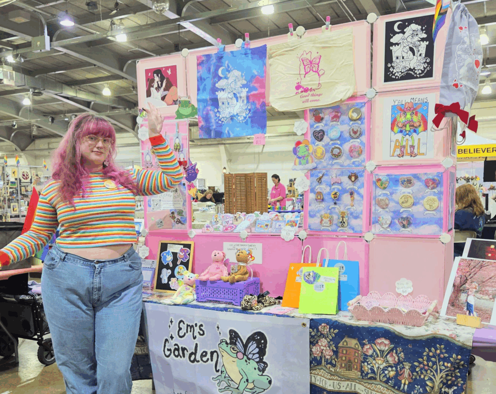Emi with their York Pride Table in 2025